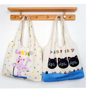 Canvas tote bag for women, large capacity casual shoulder bag, cute cat print student school bag.
