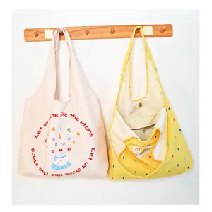 Casual canvas shoulder bag for women, cute large capacity tote bag with print and inner pocket.