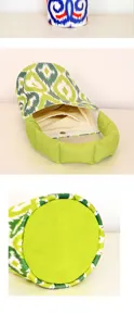 Canvas bucket bag detail featuring ethnic ikat pattern, green handle and interior pocket.