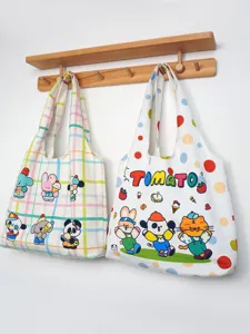 Casual canvas tote bag for women, large capacity shoulder bag with cute cartoon prints.