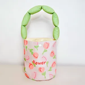 Tulip print canvas bucket bag featuring green puffy handle, cute casual handbag for summer.