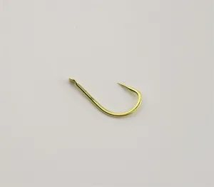 Golden fishing hook with barb, sharp point, durable metal tackle for freshwater and sea fishing.