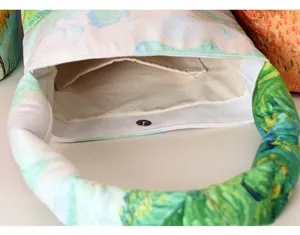 Close-up detail of the padded bucket bag interior, showing inner pocket and magnetic snap.