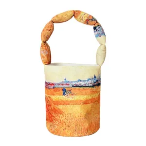 Canvas bucket bag featuring famous Van Gogh art print with unique padded handle design.