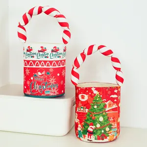 Christmas canvas candy gift bag with padded twist handles, cute holiday storage bucket.