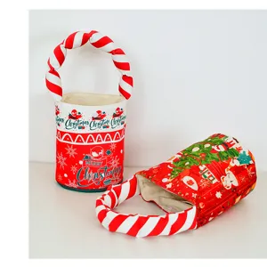 Christmas candy gift bag with padded twist handles and festive red bucket design.