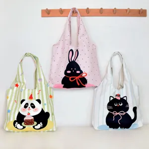 Canvas tote bag with cute cartoon animal print, casual shoulder bag for daily commuting and shopping.