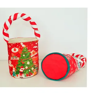Christmas candy bucket bag detail showing cute Christmas tree print and soft padded handle.