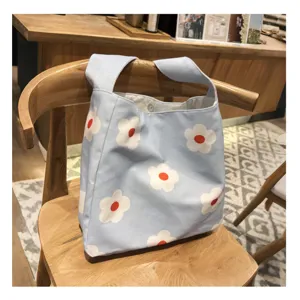 Light blue canvas shoulder bag with floral print, vintage casual tote underarm bag for women.