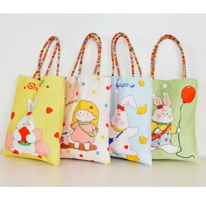 Cute cartoon print canvas handbag, portable small bag for women and students summer use.