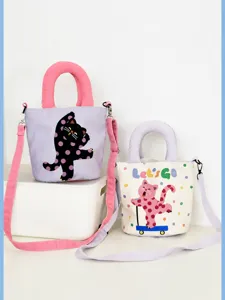 Cute padded canvas tote crossbody bag featuring polka dot cat design for women daily use.