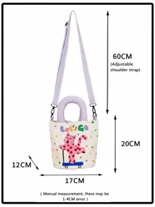 Canvas bucket bag with cute cat pattern, polka dots, purple handle, crossbody design for women.