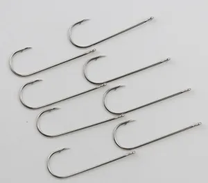 Detailed view of long shank sea fishing hooks with eyelet, durable metal for saltwater angling.