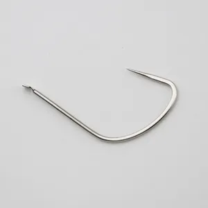 Closeup shot of a large silver fishing hook detail, showing sharp metal point structure.