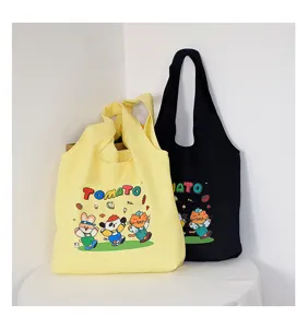 Canvas tote bag cute cartoon student shoulder bag large capacity casual handbag style.