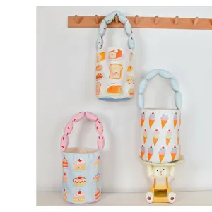 Canvas bucket bag cute cartoon print handbag with bubble handle for casual daily uses.