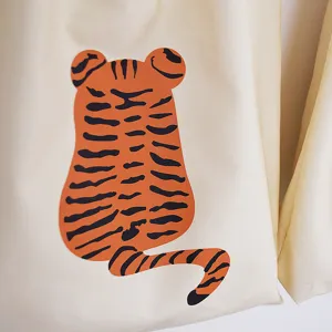 Canvas bag detail featuring a cute orange tiger back graphic print, minimalist daily bag.