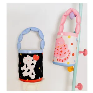 Children's cute cartoon cat print bucket bag, soft plush handbag for kids daily use.
