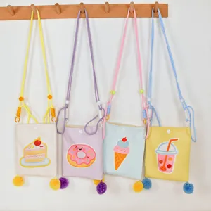 Lindo bolso cruzado de lona para niños, pequeña bolsa para teléfono con bonitos postres y pompones.