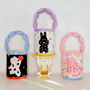 Cute cartoon animal print bucket handbag with puffy handles, stylish toddler gift tote bag.