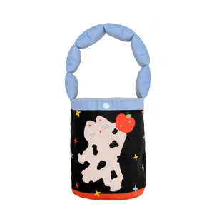 Cute velvet bucket handbag with blue bubble handle and cat apple print for kids daily use.