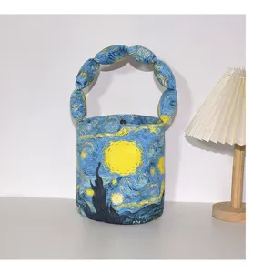 Van Gogh Starry Night art print bucket bag with unique puffy handle, versatile retro handbag.
