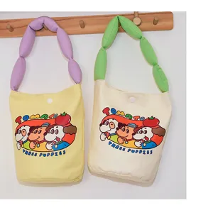 Canvas bucket bag detail, cute cartoon puppy pattern, comfortable bubble strap, daily tote.
