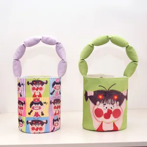 Small canvas bucket bag with cute cartoon print and unique puffy handle for women stylish daily use