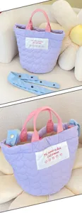 Quilted purple handbag with pink handles and blue strap, cute daily tote bag for women.