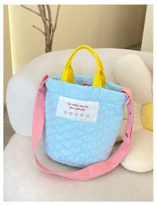 Quilted bucket bag with colorful straps, trendy casual handbag for women daily use.