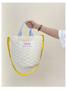 Quilted heart tote bag with blue handles and yellow crossbody strap for women casual daily use