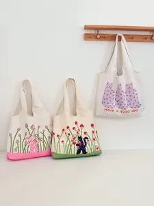 Cute polka dot cat print canvas tote bag, large capacity shoulder bag for women daily use.