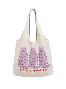 Cute polka dot cat print canvas tote bag, large capacity casual shoulder bag for women.