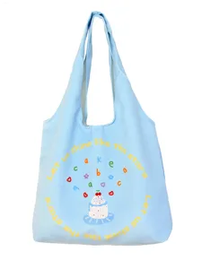 Light blue canvas shoulder bag for women, cute cake print casual tote bag for daily school use.