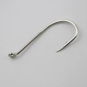 Detailed shot of a stainless steel ringed octopus fishing hook with barbs for saltwater fishing.