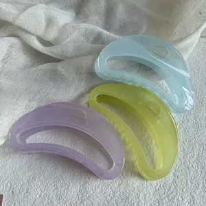 Transparent jelly crescent hair claws set, pastel colors claw clips for women bun styling.