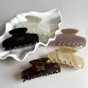Elegant acetate hair claw clip, minimalist retro French shark clip for women daily styling.