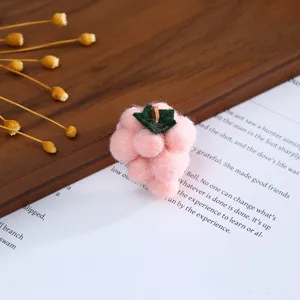 Handmade pink wool felt grape charm, cute craft DIY accessory for hairpins and hats detail.