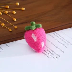 Cute wool felt strawberry charm handmade DIY craft accessory for hair clips hat decoration.