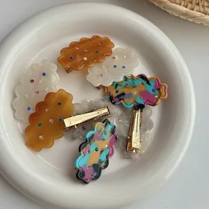 Detailed view of trendy Korean style rhinestone hair clips with colorful crystals for sweet daily look.