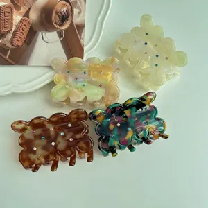 Acetate biscuit hair claw with colorful rhinestones, cute wavy cookie shark clip.