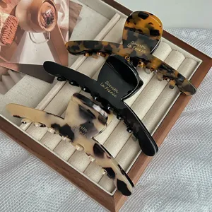 Exquisite French acetate hair claw with chic patterns, large size strong hold shark clip.