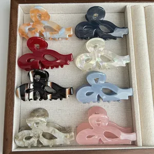 Sweet bow acetate hair claw clip set, stylish hollow hair accessories for daily wear.
