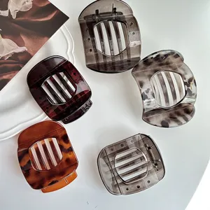 Retro curved hair claw clip set, elegant tortoise shell design for women's half up hairstyles.