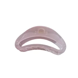 Transparent pink geometric hair claw clip, large jelly shark clip for women styling.