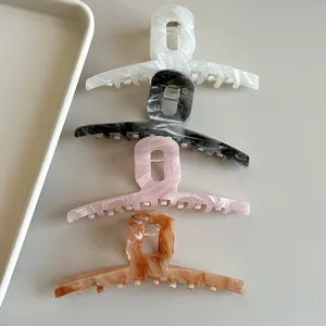 Large marble pattern hair claw clips set, stylish French aesthetic shark clips for thick hair.