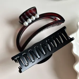 Minimalist matte black and tortoiseshell hair claw clips set, elegant french shark clip for thick hair.