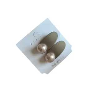 Elegant oval pearl hair clip for women side fringe duckbill clip sophisticated hair accessory