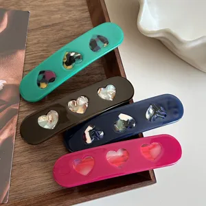 Acetate spring hair clips with sweet heart cutouts, elegant side clips for daily hairstyles.