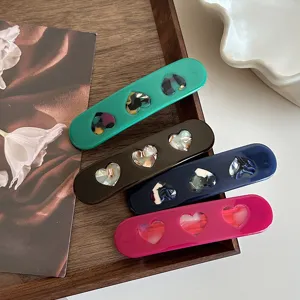 Korean style acetate hair clips set with cute heart cutouts, stylish barrettes for women and girls.